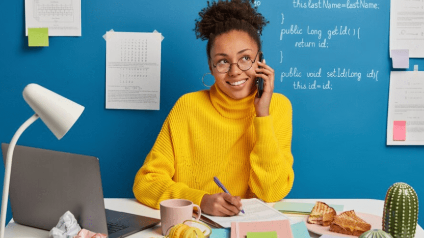 A female freelance writer working on her desk